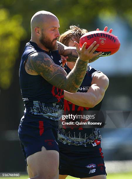 Nathan Jones of the Demons marks infront of Jack Viney during a Melbourne Demons AFL training session at Gosch's Paddock on March 21, 2016 in...