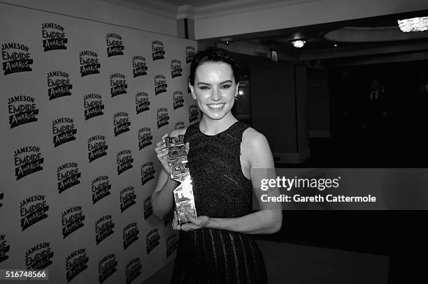 Daisy Ridley poses with the award for Best Female Newcomer in the winners room at the Jameson Empire Awards 2016 at The Grosvenor House Hotel on...