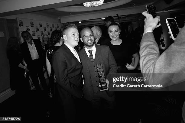 Thomas Turgoose, Andrew Shim and Chanel Cresswell pose in the winners room at the Jameson Empire Awards 2016 at The Grosvenor House Hotel on March...