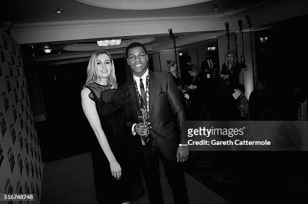 Presenter Laura Carmichael and John Boyega, winner of the Best Newcomer Male award, pose in the winners room at the Jameson Empire Awards 2016 at The...