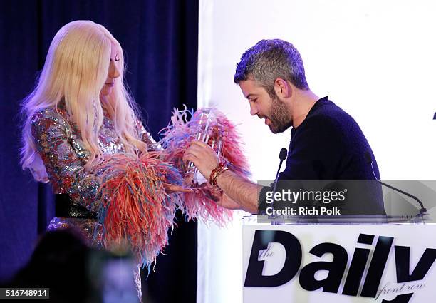 Designer Brandon Maxwell accepts Best Designer Debut award from singer/actress Lady Gaga onstage during The Daily Front Row "Fashion Los Angeles...