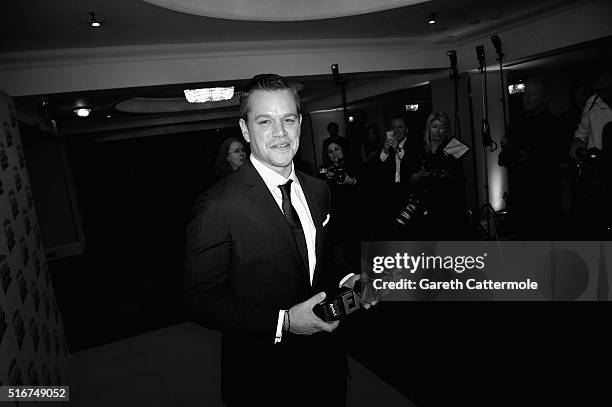 Matt Damon poses with the Jameson Best Actor award in the winners room at the Jameson Empire Awards 2016 at The Grosvenor House Hotel on March 20,...