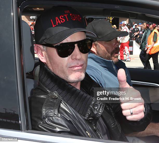 Actor and Grand Marshall of the Auto Club 400 NASCAR Sprint Cup Series Event Weekend Eric Dane gives a thumbs up at the Auto Club Speedway on March...