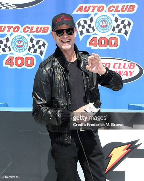 Actor and Grand Marshall of the Auto Club 400 NASCAR Sprint Cup Series Event Weekend Eric Dane gives the Start Your Engines command at the Auto Club...