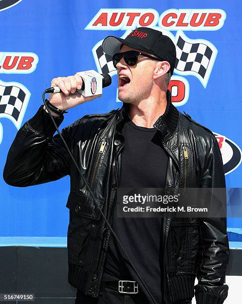 Actor and Grand Marshall of the Auto Club 400 NASCAR Sprint Cup Series Event Weekend Eric Dane gives the Start Your Engines command at the Auto Club...