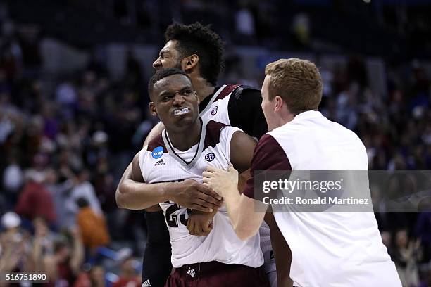 Danuel House of the Texas A&M Aggies celebrates with teammate Tonny Trocha-Morelos after defeating the Northern Iowa Panthers in double overtime with...