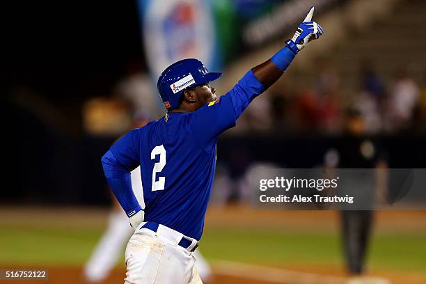 Dilson Herrera of Team Colombia celebrates after hitting the game-winning home run during Game 6 of the World Baseball Classic Qualifier against Team...