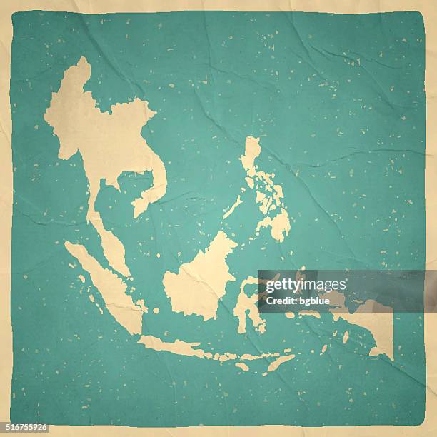 southeast asia map on old paper - vintage texture - indonesia map stock illustrations