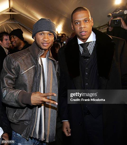 Singer Usher , and rapper Jay-Z arrive for the world premiere of concert film Jay-Z "Fade to Black", November 4, 2004 at the Zigfield theater in New...