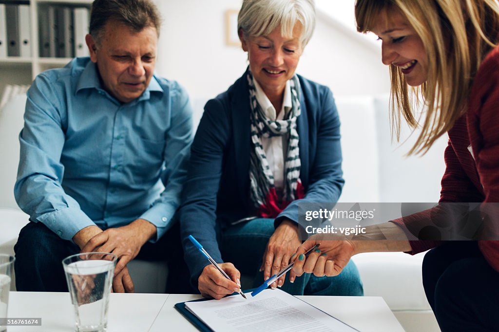 Mature Couple Meeting with Financial Advisor.