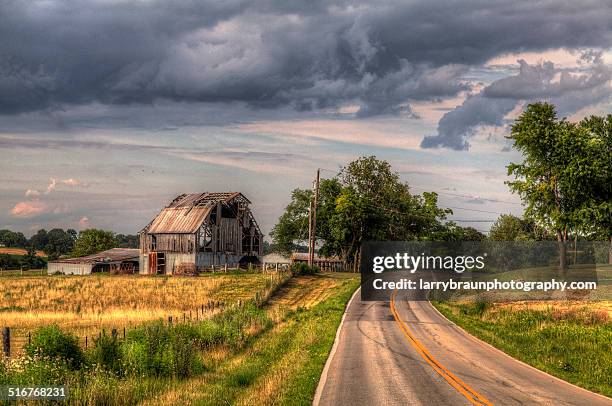 crumbling barns - rotten com stock pictures, royalty-free photos & images