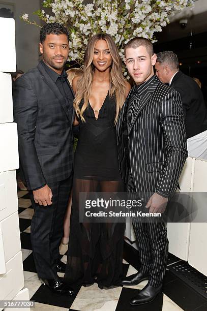 Russell Wilson; Ciara and Nick Jonas attend The Daily Front Row Fashion Los Angeles Awards Private Dinner Hosted By Eva Chow And Carine Roitfeld at...