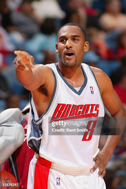 Steve Smith of the Charlotte Bobcats points during the preseason game against the Atlanta Hawks at Crown Coliseum on October 27, 2004 in...