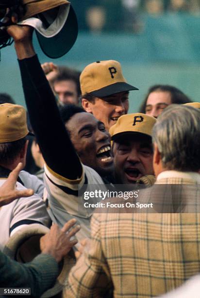 Catcher Manny Sanguillen of the Pittsburgh Pirates leads the celebreation after the Pirates defeated the Baltimore Orioles 2-1 during Game 7 of the...