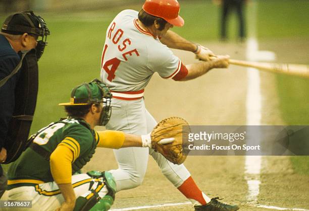 Pete Rose of the Cincinnati Reds hits the ball into the field during the World Series against the Oakland Athletics at Oakland-Alameda County...
