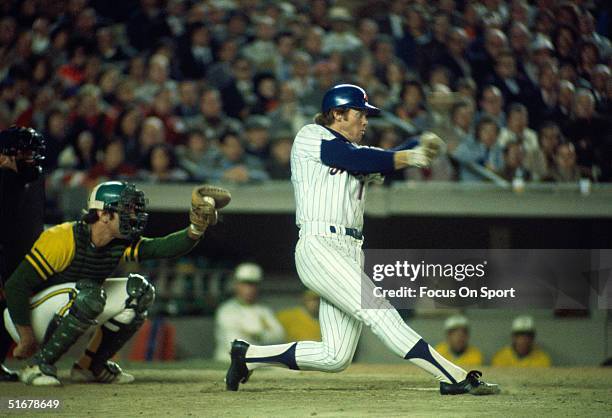 Wayne Garrett of the New York Mets hitting the ball during the World Series against the Oakland Athletics at Shea Stadium on October 1973 in...