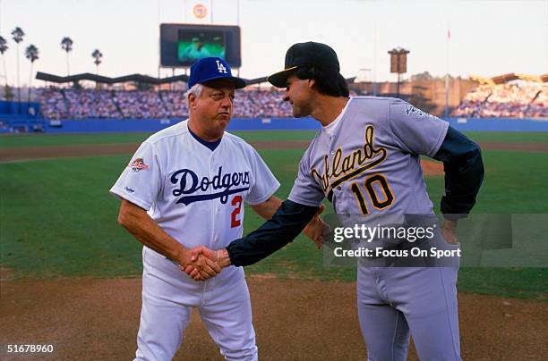 Angeles Managers Tommy Lasorda of the Los Angeles Dodgers and Tony LaRussa of the Oakland Athletics shake hands during the player introductions prior...