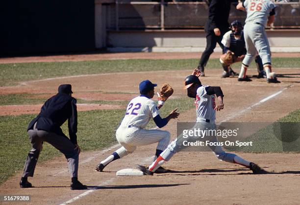 Paul Blair of the Baltimore Orioles gets back to first as Donn Clendenon of the New York Mets waits for the throw during the World Series against the...