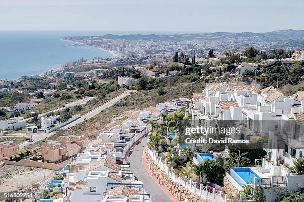 General view of villas with the city of Fuengirola on the background is seen on March 17, 2016 in Benalmadena, Spain. Spain is Europe's top...