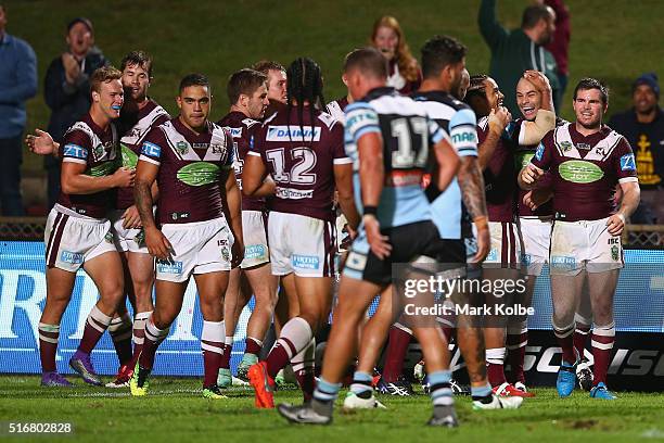 Brett Stewart of the Eagles celebrates with his team mates after scoring a try during the round three NRL match between the Manly Sea Eagles and the...