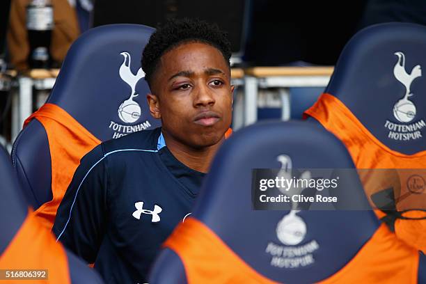 Kyle Walker-Peters of Tottenham Hotspur looks on from the bench prior to the Barclays Premier League match between Tottenham Hotspur and A.F.C....