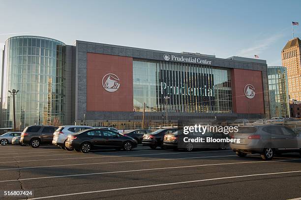 Cars are parked outside the Prudential Center in Newark, New Jersey, U.S., on Wednesday, March 9, 2016. New Jersey's credit rating has tumbled to the...