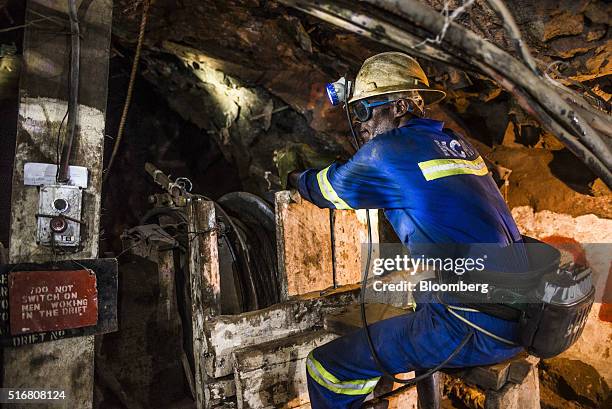 Miner uses a machine to excavate copper ore in an underground tunnel at the 296 meter level at the Nchanga copper mine, operated by Konkola Copper...