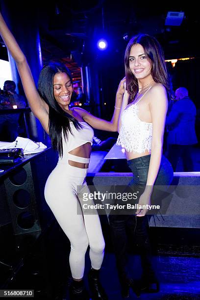 Bracket Challenge Party: Portrait of SI Swimsuit models Bo Krsmanovic and Ebonee Davis dancing during event at Slate. New York, NY 3/14/2016 CREDIT:...