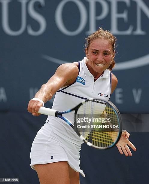 Anna Smashnova of Israel returns a volley to Marie-Gaianeh Mikaelian of Switzerland during the first round of the US Open Tennis Tournament 27...