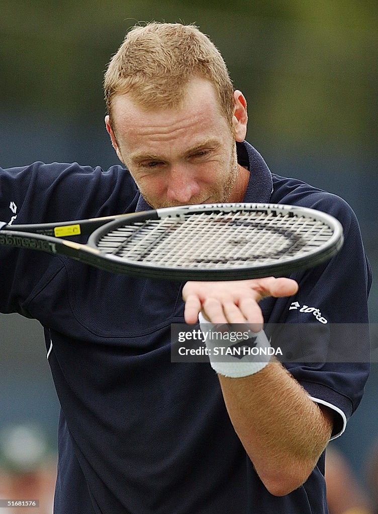 Marc Rosset of Switzerland tries to divine the rea