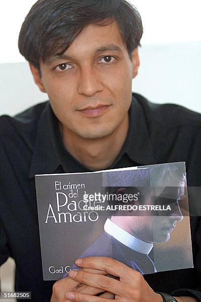 Mexican film director Carlos Carrera discusses his new motion picture, "El Crimen del Padre Amaro" during an interview with AFP 09 August 2002 in...