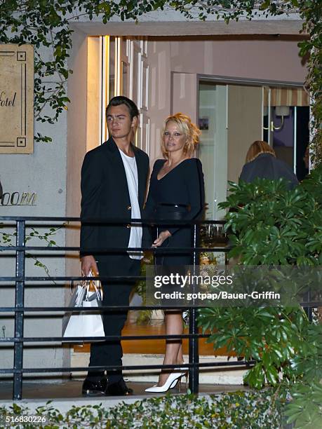 Pamela Anderson with her son Brandon Thomas Lee are seen leaving 'Fashion Los Angeles Awards' at Sunset Tower Hotel on March 20, 2016 in Los Angeles,...