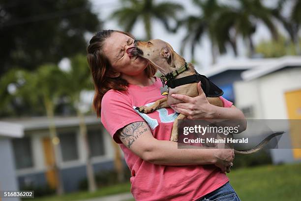 Crystal Jacques, a hospitality and tourism major, holds her dog Oliver, a trained pet therapy dog. Jacques and Oliver live in student housing at the...