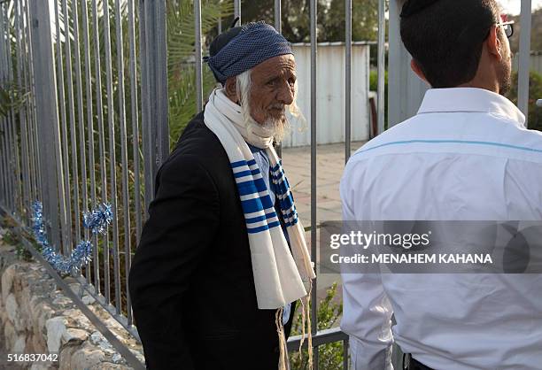 An elderly Yemeni Jew arrives at an immigration centre in the Israeli city of Beersheba on March 21, 2016 following a secret rescue operation to...