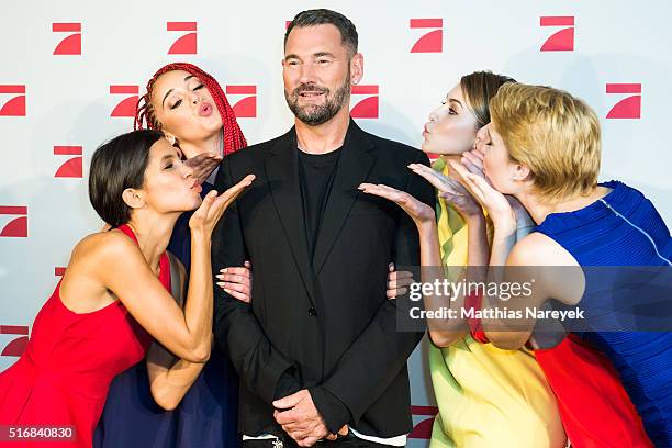 The models Luana, Kim, Laura, Laura B., Lara and designer Michael Michalsky pose during a photo call for the tv show 'Germany's Next Topmodel' on...