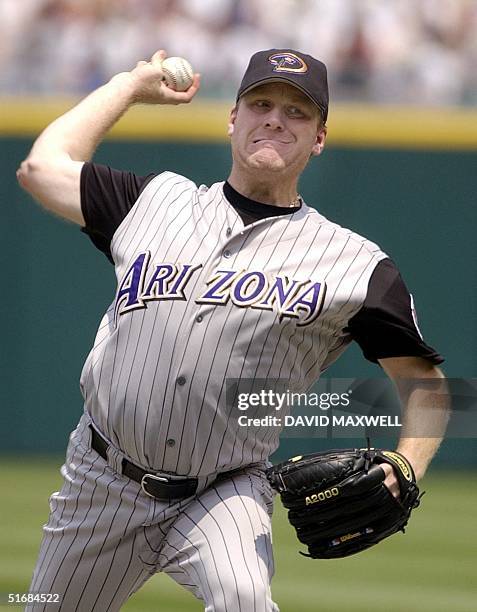 Arizona Diamondbacks pitcher Curt Schilling delivers a pitch against the Cleveland Indians on 30 June, 2002 at Jacobs Field in Cleveland, OH....