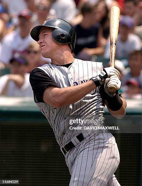 Arizona Diamondbacks catcher Damian Miller hits a two run double off of Cleveland Indians pitcher Danys Baez duriing the first inning on 30 June,...