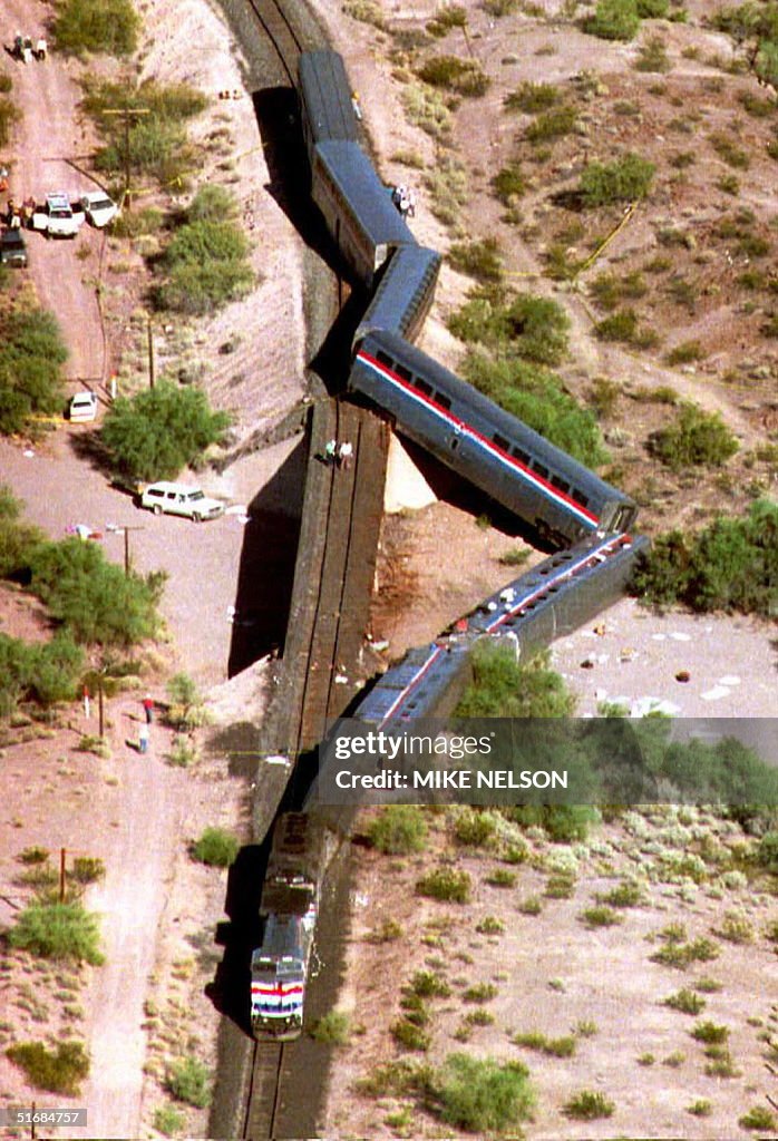 Rescue workers and vehicles assist at the site of