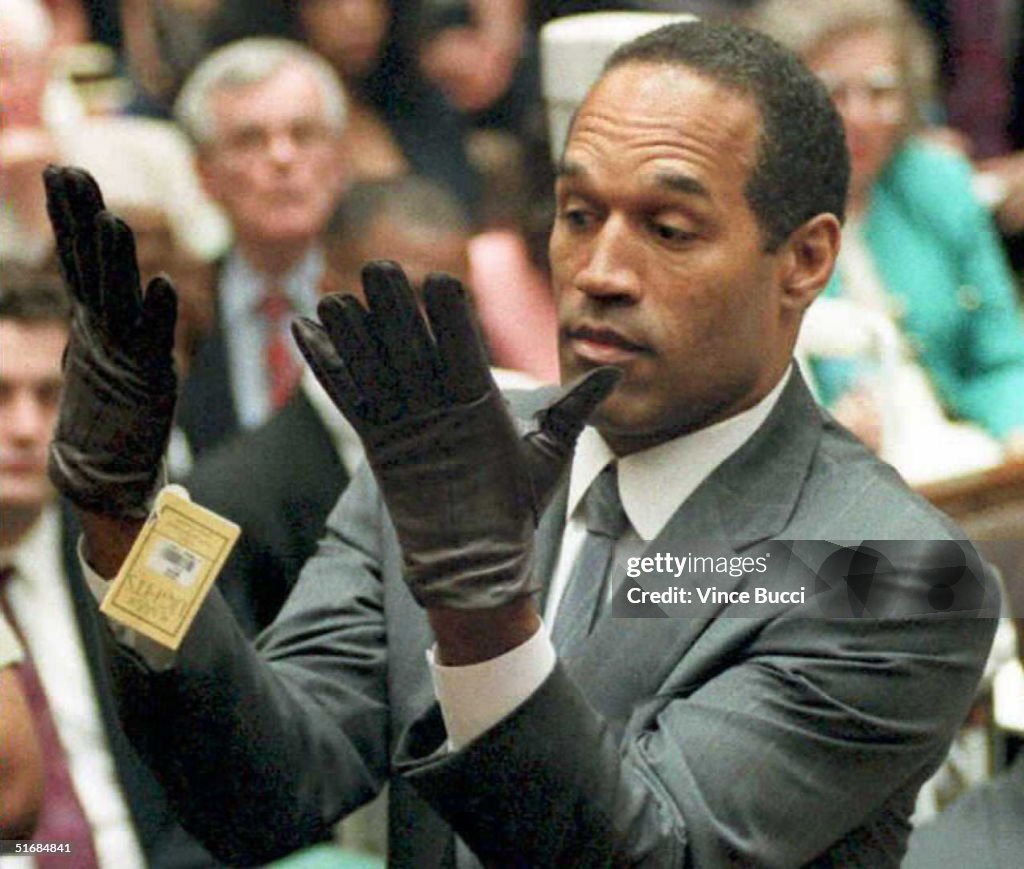 (YEARENDER 13) O.J. Simpson looks at a new pair of
