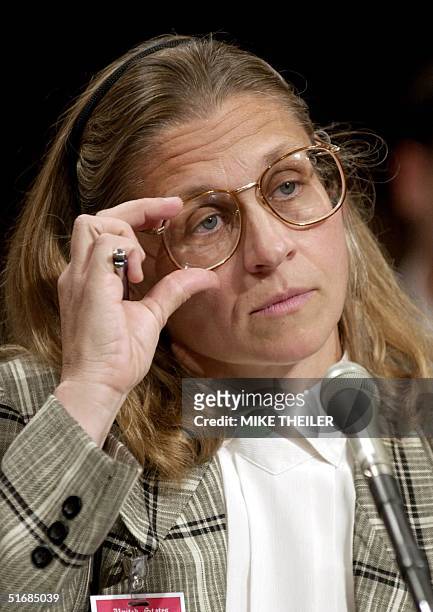 Agent Colleen Rowley listens to questions from the US Senate Judiciary Committee 06 June 2002 on Capitol Hill in Washington, DC, during a hearing on...