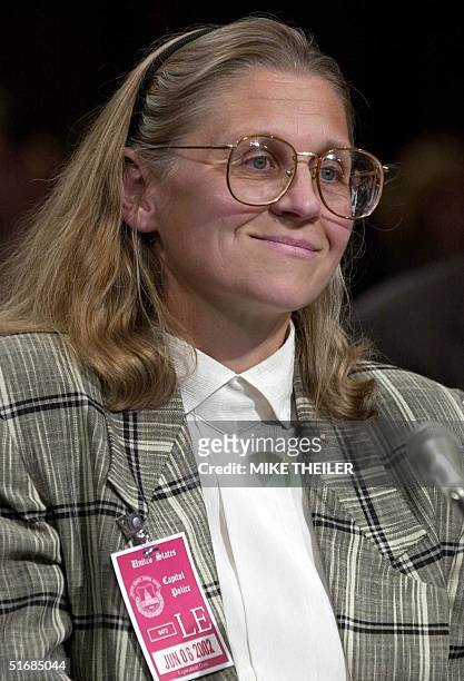 Minneapolis-based FBI Agent Colleen Rowley listens to questions in the Senate Judiciary Committee room 06 June, 2002 on Capitol Hill in Washington,...
