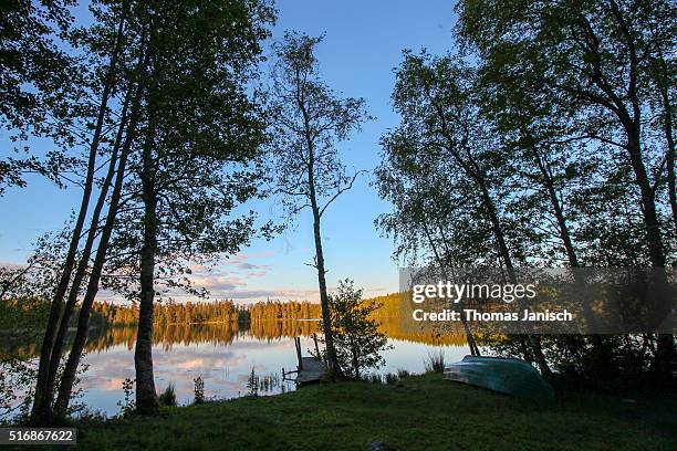 lake & forest wilderness of tiveden national park during sunset - laxa stock pictures, royalty-free photos & images