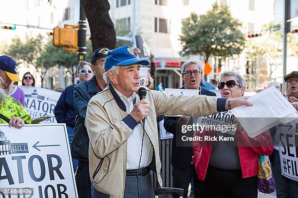 Local attorney, Lou McCreary speaks to protesters outside of Senator John Cornyn's office building during National Day Of Action calling on Senate...