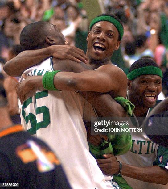 Paul Pierce hugs Eric Williams of the Boston Celtics after beating the New Jersey Nets in game three of the Eastern Conference Finals at the Fleet...