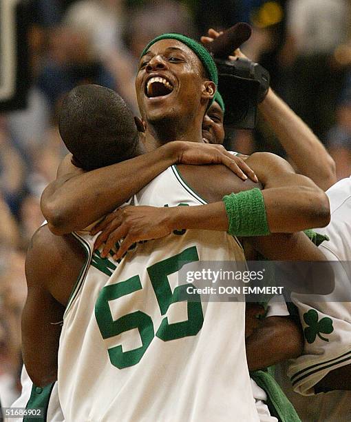 Paul Pierce of the Boston Celtics hugs teammate Eric Williams in celebration after game 3 of the NBA Eastern Conference Finals 25 May, 2002 in...