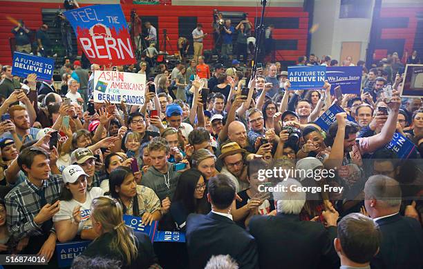 Democratic presidential candidate Bernie Sanders shakes hands after a speech at West High School at a campaign rally on March 21, 2016 in Salt Lake...