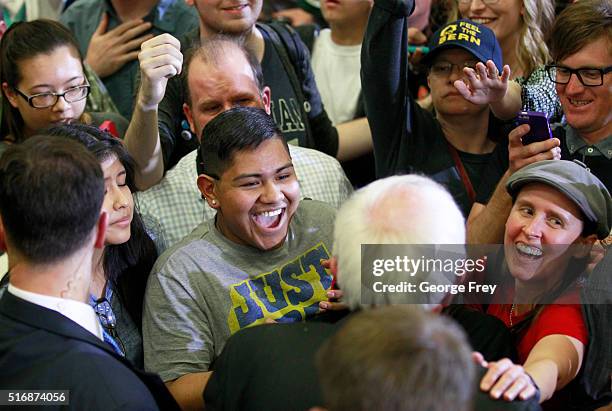 Democratic presidential candidate Bernie Sanders shakes hands after a speech at West High School at a campaign rally on March 21, 2016 in Salt Lake...