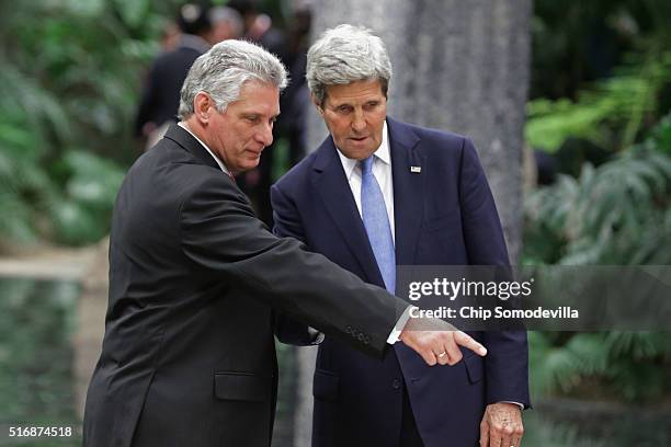 Cuban Vice President Miguel Daz-Canel talks with U.S. Secretary of State John Kerry during a state dinner at the Palace of the Revolution March 21,...