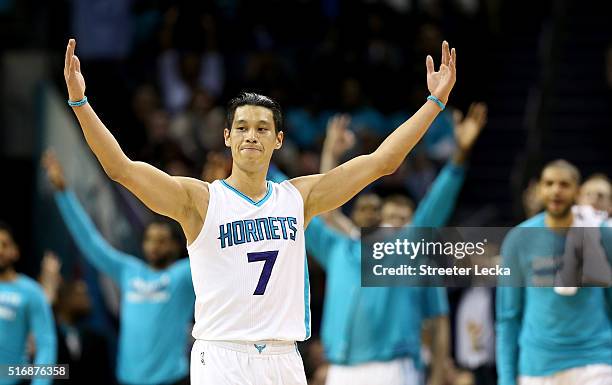 Jeremy Lin of the Charlotte Hornets reacts after making a basket against the San Antonio Spurs during their game at Time Warner Cable Arena on March...