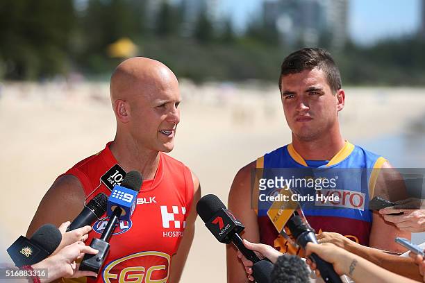 Gold Coast Suns captain Gary Ablett and Brisbane Lions captain Tom Rockliff speak to media during a press conference at Oskars on Burleigh on March...